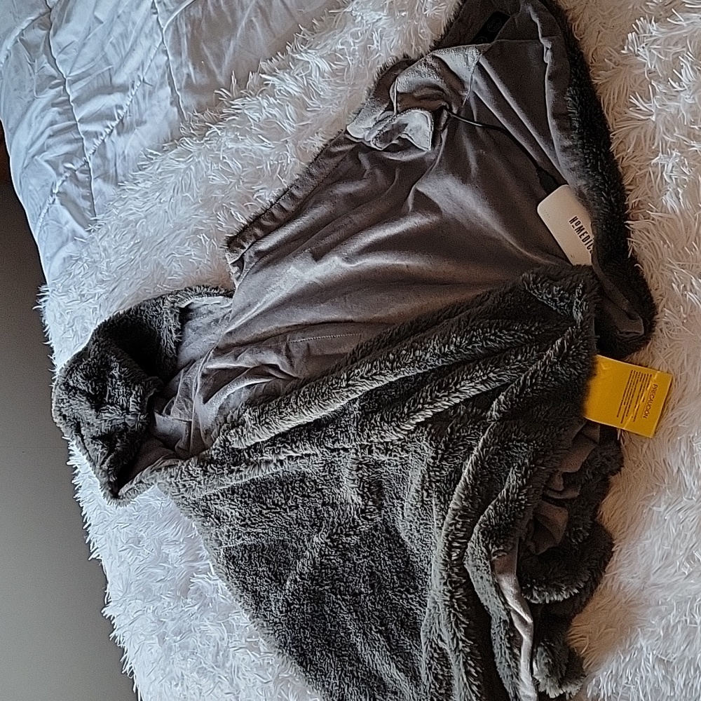 Heated shawl with hood and shoulder massager.